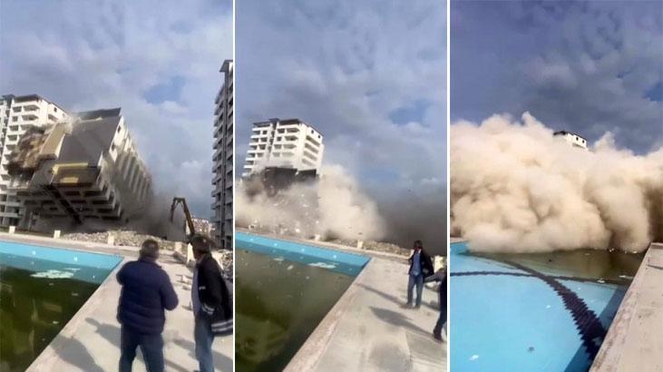 Hatay’da 13 katlı bina iş makinesinin darbesiyle yerle bir oldu